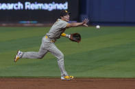 San Diego Padres shortstop Ha-Seong Kim (7) fields a hit during the second inning of a baseball game against the Miami Marlins, Monday, Aug. 15, 2022, in Miami. (AP Photo/Marta Lavandier)