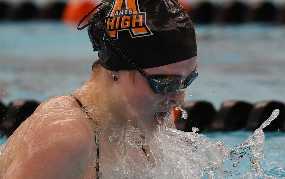 Ames' Reese Winer swims during 100-yard breaststroke in a dual meet against Mason City