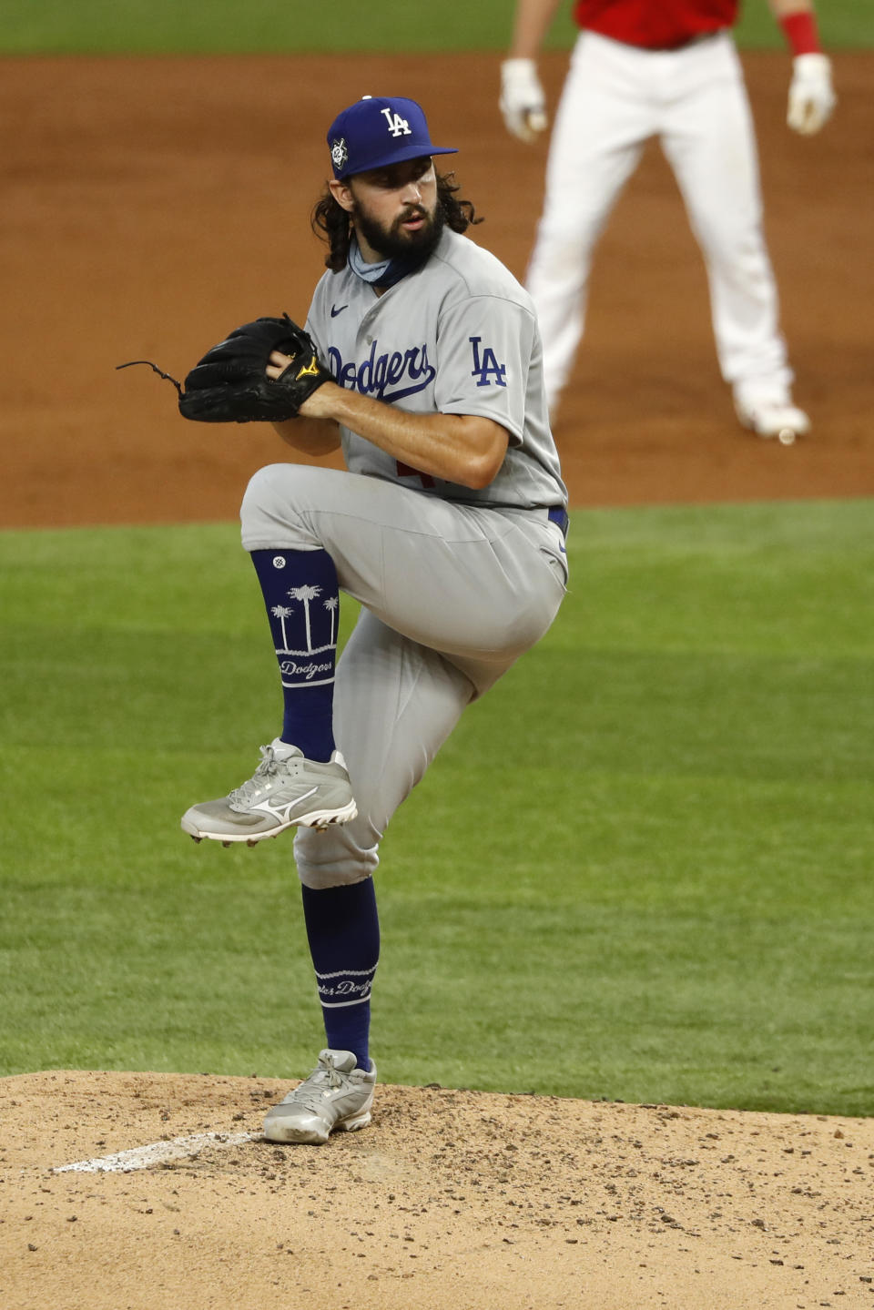 Los Angeles Dodgers starting pitcher Tony Gonsolin throws during the third inning of a baseball game against the Los Angeles Dodgers in Arlington, Texas, Sunday, Aug. 30, 2020. (AP Photo/Roger Steinman)