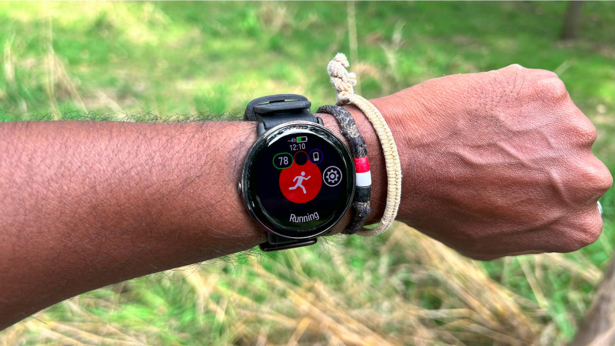  Man wearing Polar Ignite 3 Titanium GPS watch. 