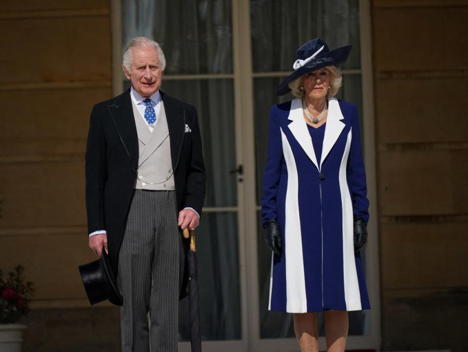 <div class="inline-image__caption"><p>Britain's King Charles and Camilla, Queen Consort stand on the steps during a Garden Party, in celebration of King Charles' coronation, at Buckingham Palace, London, Britain.</p></div> <div class="inline-image__credit">Yui Mok via Reuters</div>