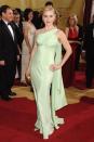 <p> A vision in sage. Kate looked radiant in the floor-length satin gown at the 79th Annual Academy Awards ceremony in Hollywood. With a gathered cross-over, asymmetric neckline and cascading draped back, the <em>Revolutionary Road</em> actress was certainly dressed for the glamorous occasion. </p>