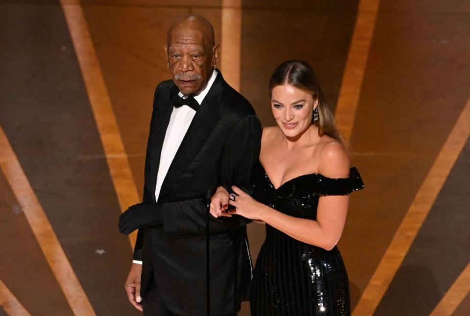 us actor morgan freeman l and australian actress margot robbie speak onstage during the 95th annual academy awards at the dolby theatre in hollywood, california on march 12, 2023 photo by patrick t fallon afp photo by patrick t fallonafp via getty images