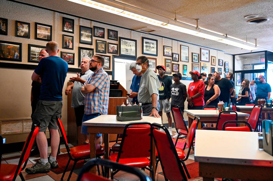 Customers lined up out the door at Arthur Bryant’s Barbeque. It’s operated at 1727 Brooklyn Ave. since 1959, but its roots date decades earlier.