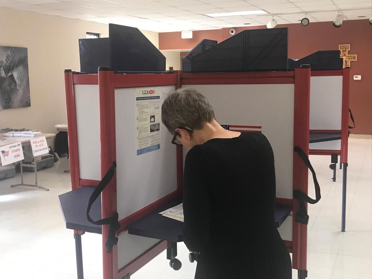 Chatham voter Maryanne Pogge casts her ballot in the 2023 consolidated election on Tuesday, April 4, 2023.