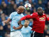 <p>Manchester City’s Vincent Kompany gets the better of United’s Romelu Lukaku </p>