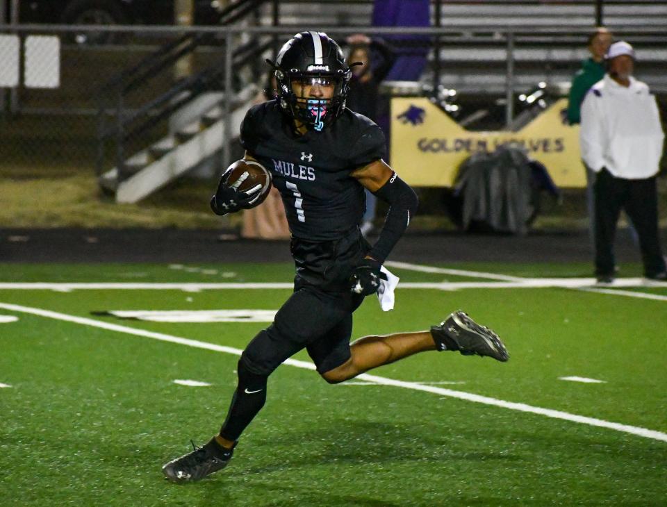 Muleshoe's Irvin Torres Irvin Torres escapes into space on his way for a 44-yard touchdown on Friday, Oct. 29, 2021, in Muleshoe.