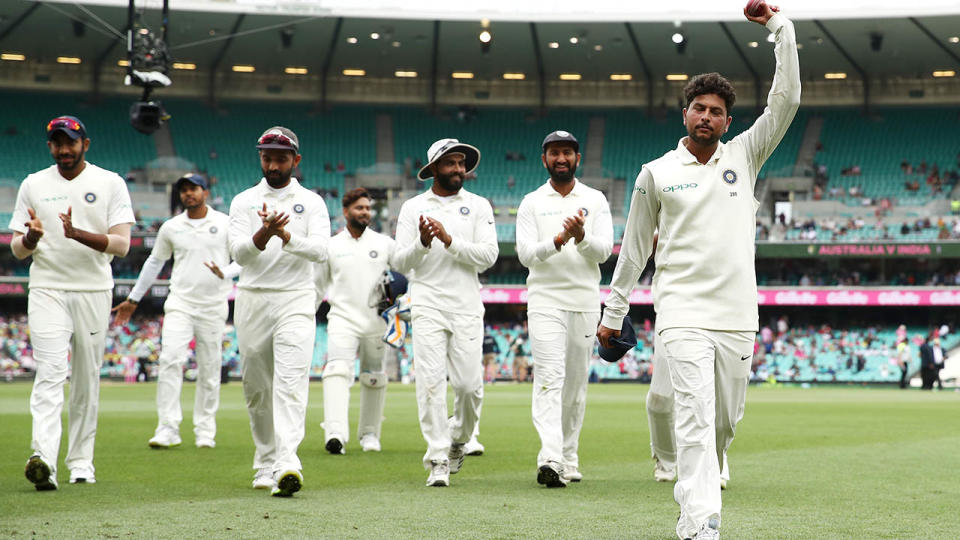 Kuldeep Yadav celebrates taking five wickets. (Photo by Cameron Spencer/Getty Images)