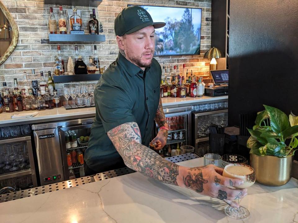 Jake Koons makes a Gingerbread Martini, a specialty drink at Brick + Bramble.