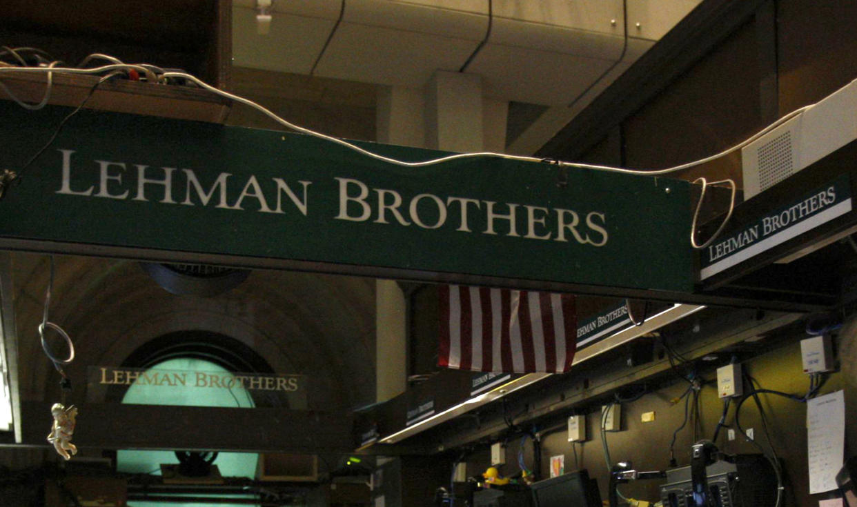 The Lehman Brothers booth on the trading floor of the New York Stock Exchange, is shown in this September 16, 2008 file photo. September 14, 2009 marks the one year anniversary of the bankruptcy filing of Lehman Brothers. Picture taken September 16, 2008.  REUTERS/Brendan McDermid/Files (UNITED STATES BUSINESS ANNIVERSARY EMPLOYMENT)