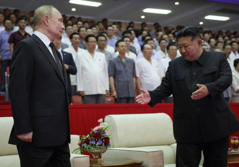 Russian President Vladimir Putin and North Korea's leader Kim Jong Un attend a gala concert in Pyongyang on June 19, 2024, in a photograph distributed by Russia's Sputnik agency (Gavriil GRIGOROV)