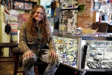 Kathleen Chippi poses in her shop in Nederland, Colorado March 14, 2015. REUTERS/Rick Wilking