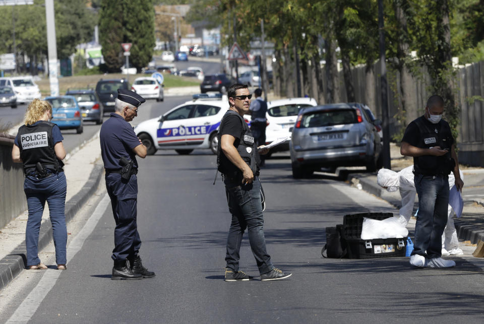<p>Police officers block the road near a bus stop in La Valentine district after a van rammed into two bus stops in the French port city of Marseille, southern France, Aug. 21, 2017. (Photo: Claude Paris/AP) </p>