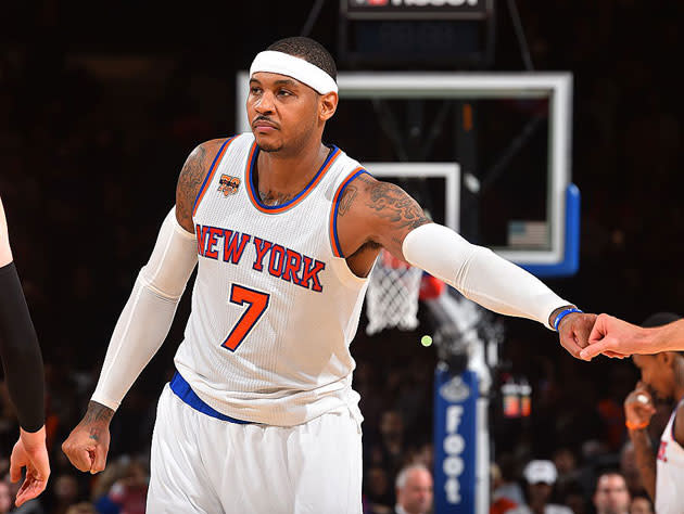 Carmelo Anthony plays his role in the circle. (Getty Images)