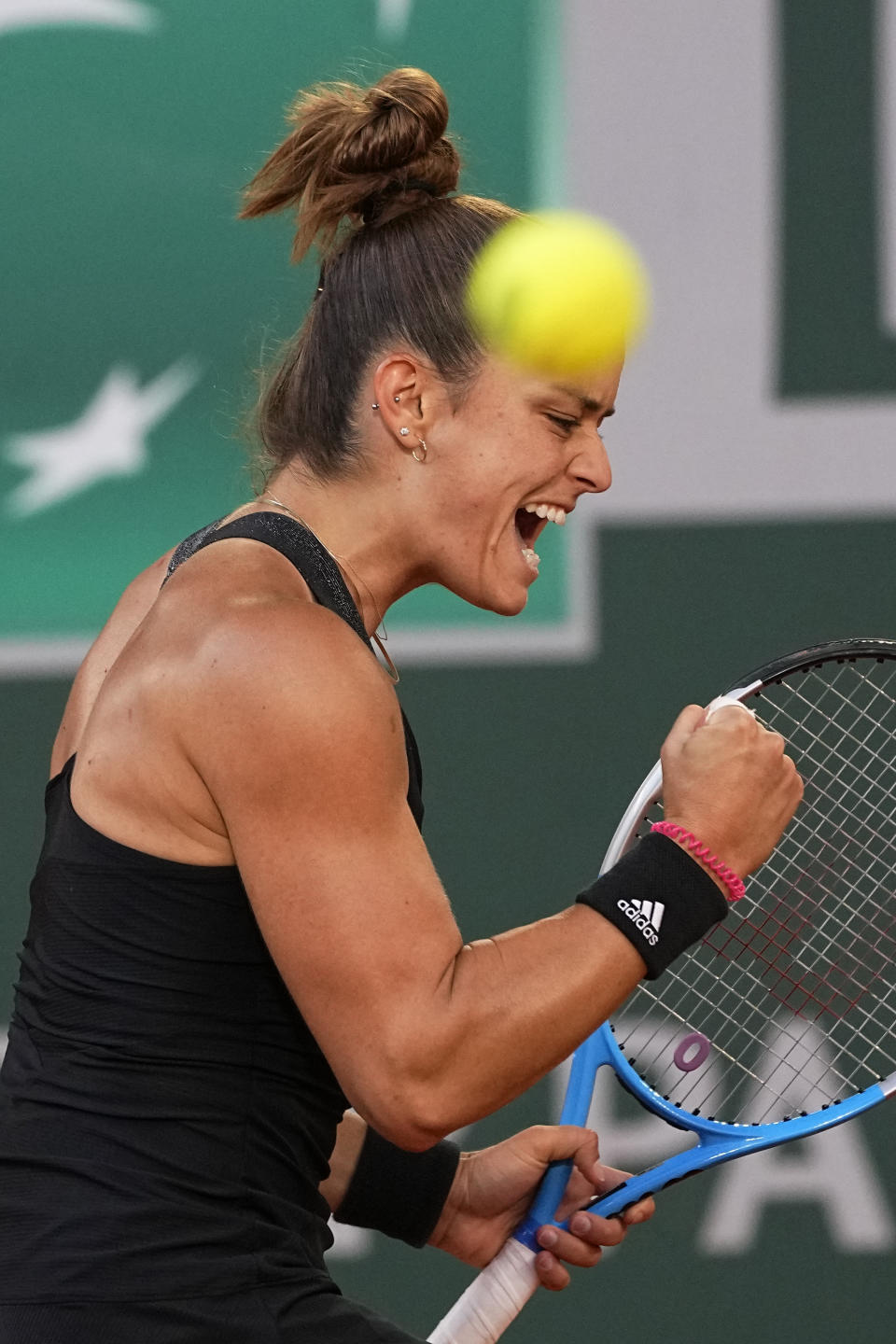 Maria Sakkari of Greece celebrates after winning a point against Czech Republic's Barbora Krejcikova during their semifinal match of the French Open tennis tournament at the Roland Garros stadium Thursday, June 10, 2021 in Paris. (AP Photo/Michel Euler)