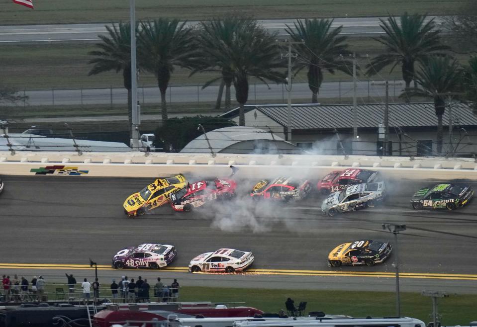Michael McDowell (34), Ryan Preece (41), Martin Truex (19) and Kevin Harvick (4) are swept up in a third stage crash during Sunday's Daytona 500.