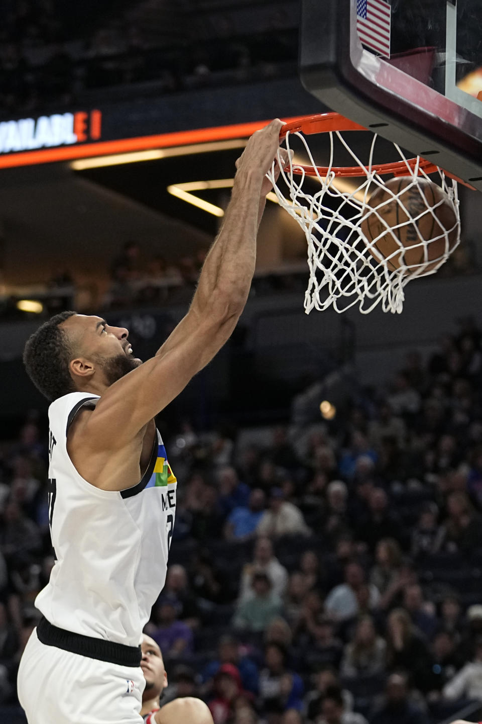 Minnesota Timberwolves center Rudy Gobert dunks during the first half of an NBA basketball game against the Portland Trail Blazers, Sunday, April 2, 2023, in Minneapolis. (AP Photo/Abbie Parr)