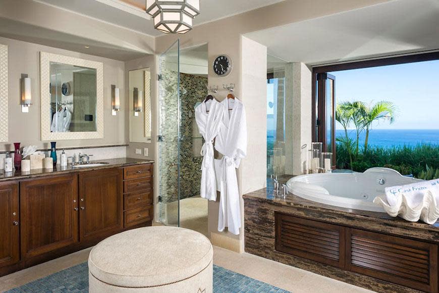 The bath is situated against the glass window which overlooks the beautiful coastline. Ah...the serenity!