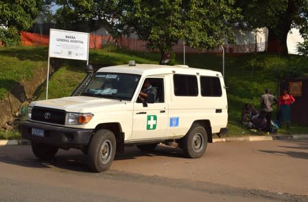 An ambulance drives from the Bwera general hospital near the border with the Democratic Republic of Congo in Bwera