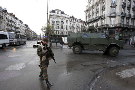 Belgian soldiers patrol in central Brussels, November 22, 2015, after security was tightened in Belgium following the fatal attacks in Paris. REUTERS/Youssef Boudlal