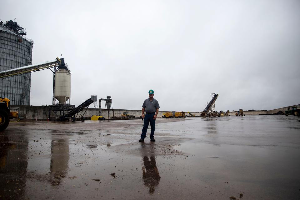 Kelly Nieuwenhuis, a farmer and Siouxland Energy Cooperative board of directors chairman, stands in the empty corn storage bunker that would soon be filled with corn from this season's harvest if the plant had not halted production on Wednesday, Oct. 2, 2019, outside of Sioux Center. 