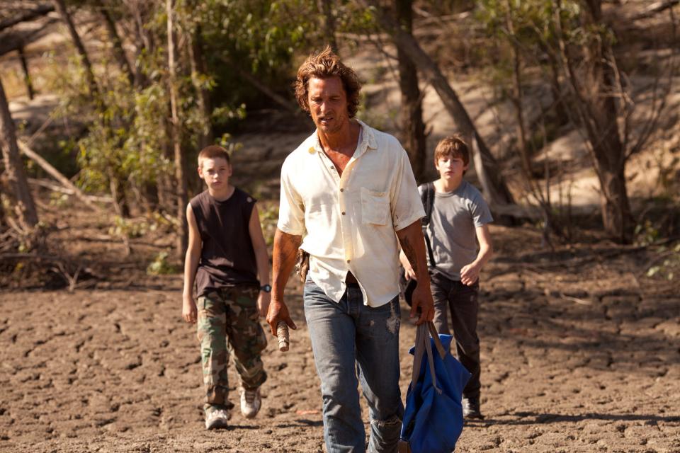 Matthew McConaughey (center) is a mysterious stranger who befriends two Arkansas boys (Jacob Lofland and Tye Sheridan) in the coming-of-age drama "Mud."