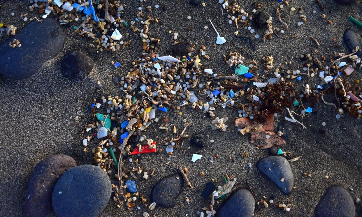 <span>Microplastics and other pieces of rubbish in the sand in Lanzarote, Spain.</span><span>Photograph: Susanne Fritzsche/Alamy</span>