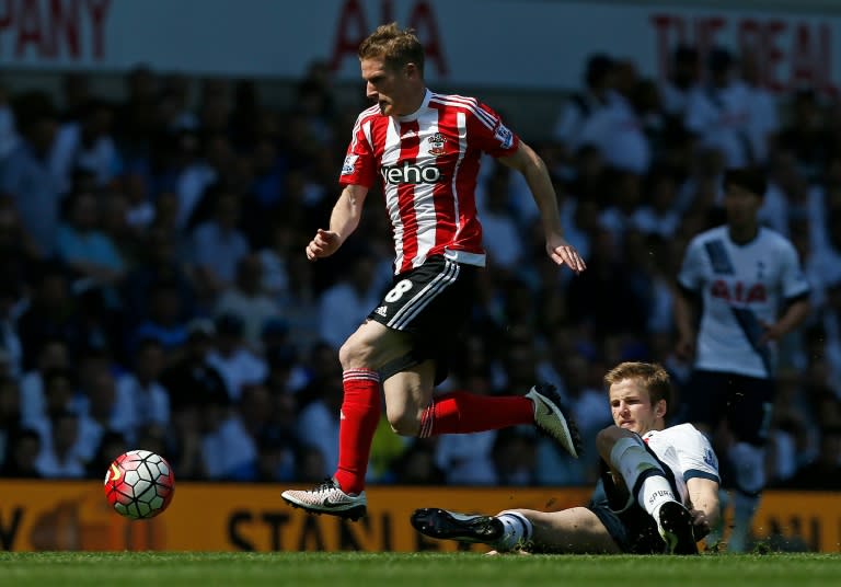 Southampton's Steven Davis jumps a tackle during the English Premier League match against Tottenham Hotspur at White Hart Lane in London, on May 8, 2016