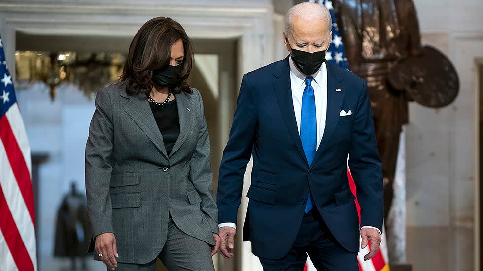 Vice President Kamala Harris and President Joe Biden arrive to give remarks in Statuary Hall of the U.S Capitol in Washington, D.C., on Thursday, January 6, 2022 to mark the one year anniversary of the attack on the Capitol.