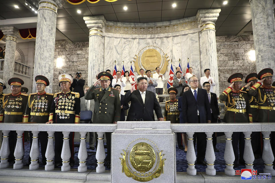 In this photo provided by the North Korean government, North Korean leader Kim Jong Un, center, Russian Defense Minister Sergei Shoigu, fourth left, and China's Vice Chairman of the standing committee of the country’s National People’s Congress Li Hongzhong, third right, attend a military parade to mark the 70th anniversary of the armistice that halted fighting in the 1950-53 Korean War, on Kim Il Sung Square in Pyongyang, North Korea Thursday, July 27, 2023. Independent journalists were not given access to cover the event depicted in this image distributed by the North Korean government. The content of this image is as provided and cannot be independently verified. Korean language watermark on image as provided by source reads: "KCNA" which is the abbreviation for Korean Central News Agency. (Korean Central News Agency/Korea News Service via AP)