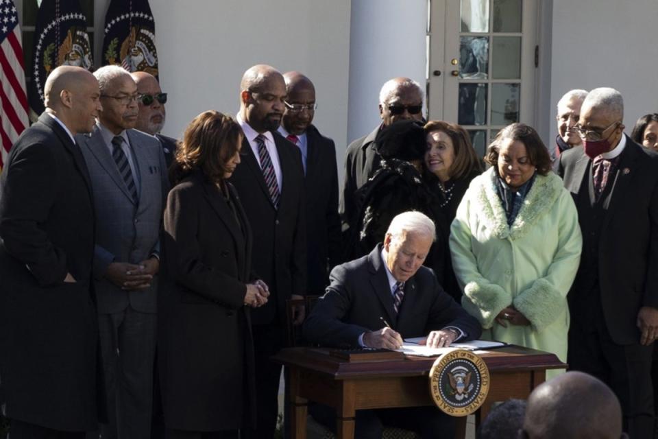President Joe Biden signed the Emmett Till Antilynching Act at the White House in March 2022. (EPA)