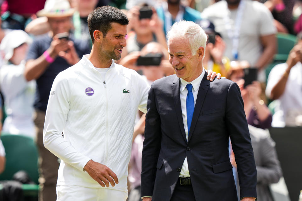 John McEnroe (pictured right) and Novak Djokovic (pictured left) share a laugh at Wimbledon.