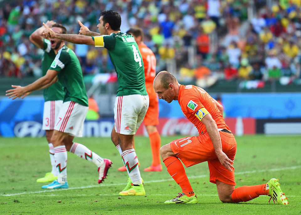 Arjen Robben y Rafa Marquez.