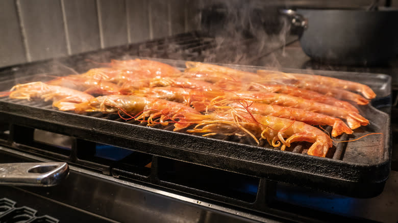 cooking shrimp on hot plancha