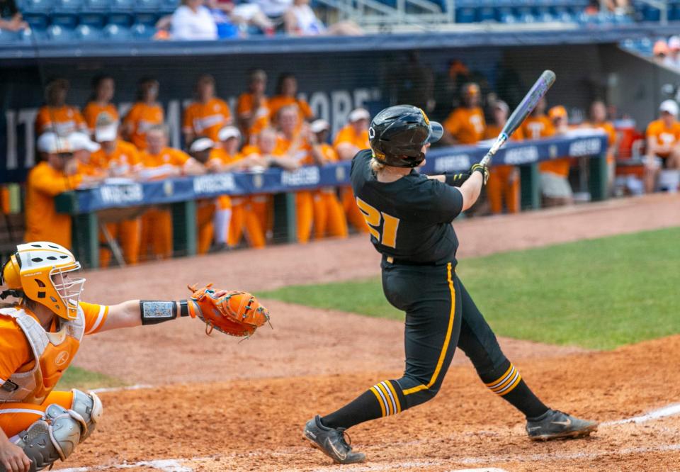 Missouri first baseman Emma Raabe (21) hits a double in the top of the third inning against Tennessee in the semifinal game of the SEC Tournament on Friday at Katie Seashole Pressly Stadium in Gainesville, Fla.