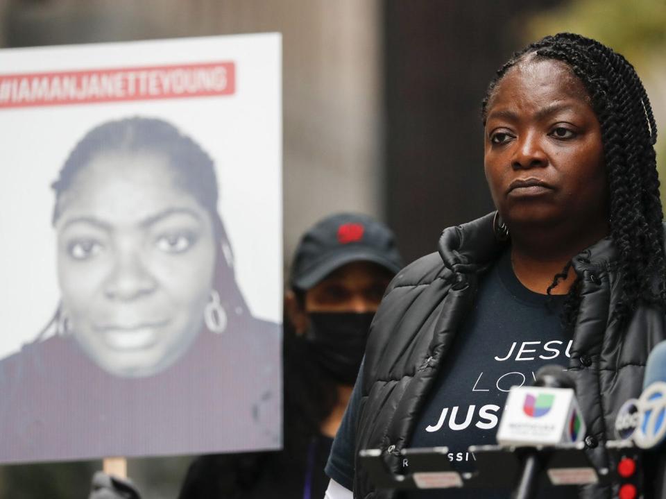 Anjanette Young and supporters gather at Daley Plaza in Chicago after marching from Federal Plaza to commemorate the National Day of Protests on Oct. 22, 2021.