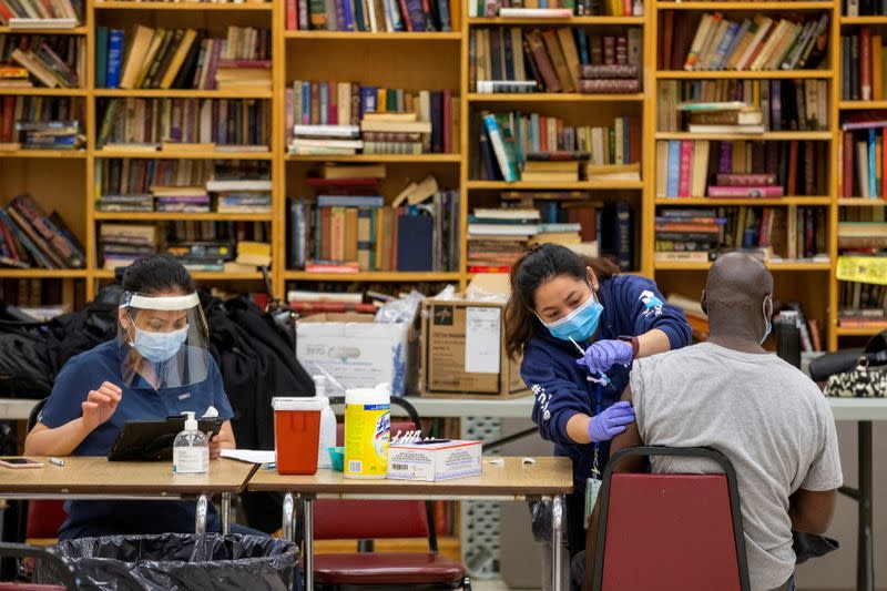 FILE PHOTO: COVID-19 vaccinations at a Toronto Community Housing building