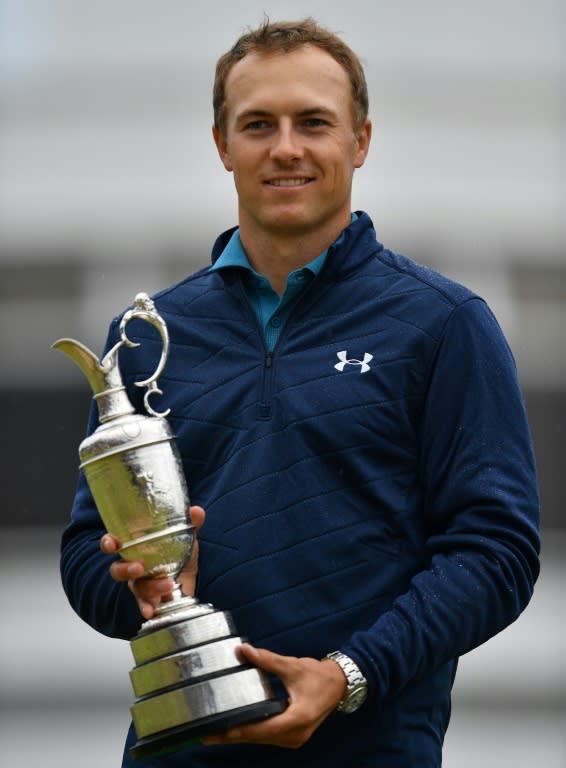 US golfer Jordan Spieth poses for pictures with the Claret Jug at Royal Birkdale on July 23, 2017