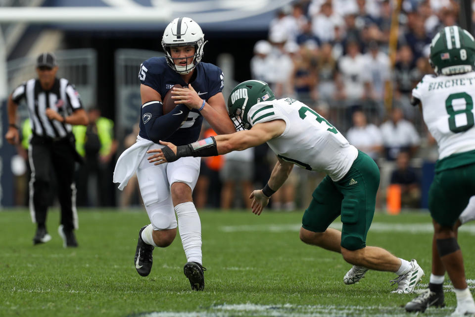 Sep 10, 2022; University Park, Pennsylvania, USA; Penn State Nittany Lions quarterback Drew Allar (15) runs with the ball while trying to avoid a tackle during the third quarter against the Ohio Bobcats at Beaver Stadium. Penn State defeated Ohio 46-10. Mandatory Credit: Matthew OHaren-USA TODAY Sports