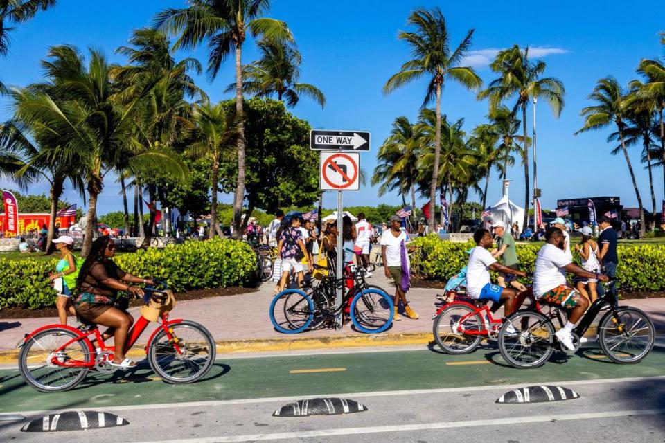 Crowds move up and down Ocean Drive during Memorial Day weekend at Miami Beach, Florida, on Sunday, May 28, 2023.