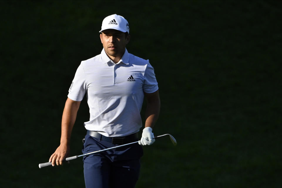 Xander Schauffele walks along the fairway during the final round of the CJ Cup golf tournament at Shadow Creek Golf Course, Sunday, Oct. 18, 2020, in North Las Vegas. (AP Photo/David Becker)