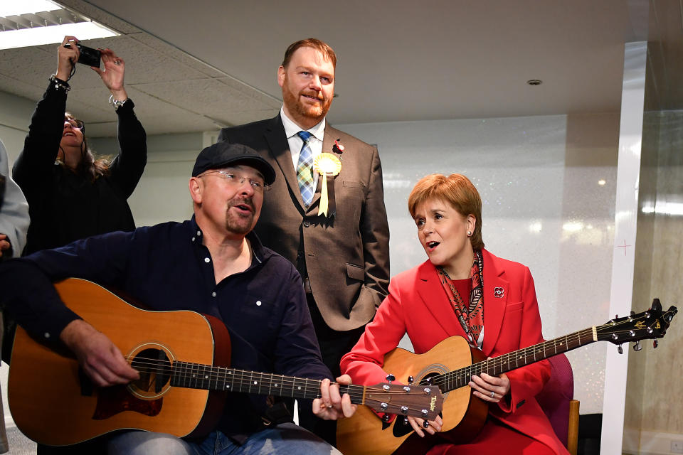 SNP leader Nicola Sturgeon visits Dalkeith Community Hub in Dalkeith, Scotland, where she was invited to strum a tune.