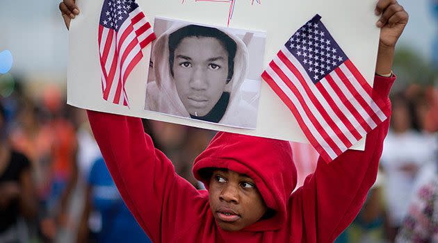 Jaylen Reese, 12, of Atlanta, marches to downtown during a protest of George Zimmerman's not guilty verdict in the 2012 shooting death of teenager Trayvon Martin. Photo: AAP