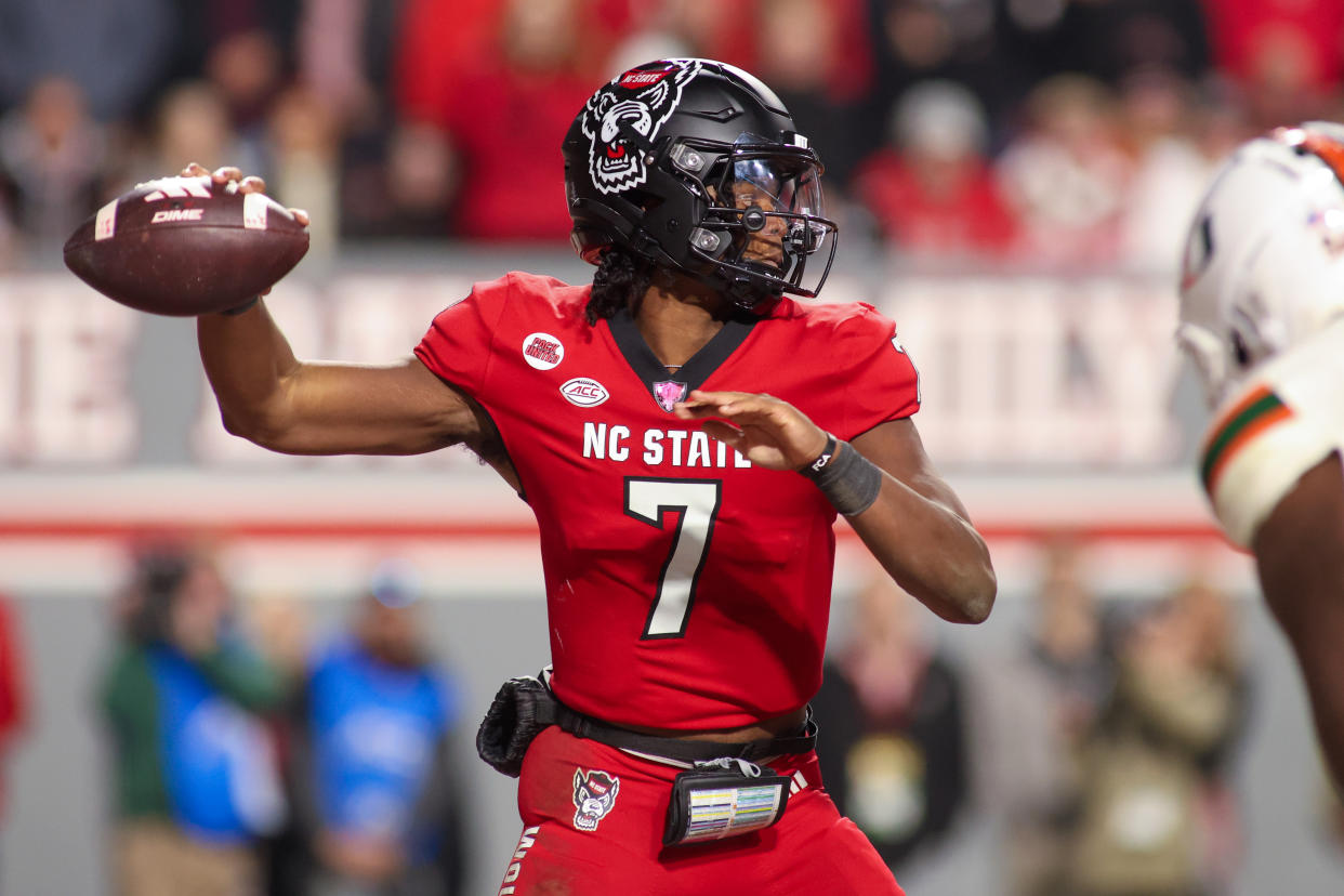 RALEIGH, NC - NOVEMBER 04: North Carolina State Wolfpack quarterback MJ Morris (7) throws during the college football game between the North Carolina State Wolfpack and the Miami Hurricanes on November 4, 2023 at Carter-Finley Stadium in Raleigh, NC. (Photo by Nicholas Faulkner/Icon Sportswire via Getty Images)