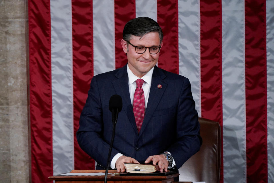 Newly elected Speaker of the House Mike Johnson (R-LA) smiles as he reacts to the applause of members of the House after being elected to be the new Speaker at the U.S. Capitol in Washington, U.S., October 25, 2023. REUTERS/Elizabeth Frantz