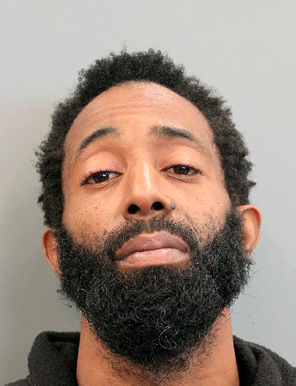 This booking photo provided by the Houston Police Department shows Tony Earls on Tuesday, Feb. 15, 2022 (Houston Police Department)