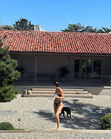 <p>Kendall Jenner/Instagram</p> Kendall Jenner spent the start of NYFW in a bikini with her dog Pyro.