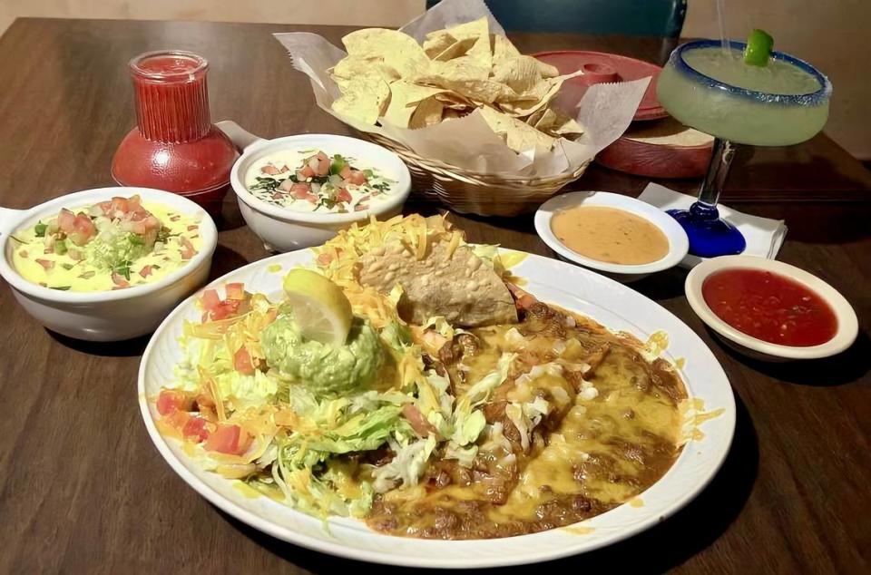 90-plus years of history at The Original Mexican Eats Cafe: a “Roosevelt Special” with chalupa, enchilada, taco and dips.