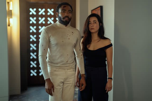 <p>David Lee/Prime Video</p> (L-R) Donald Glover and Maya Erskine in 'Mr. and Mrs. Smith'.