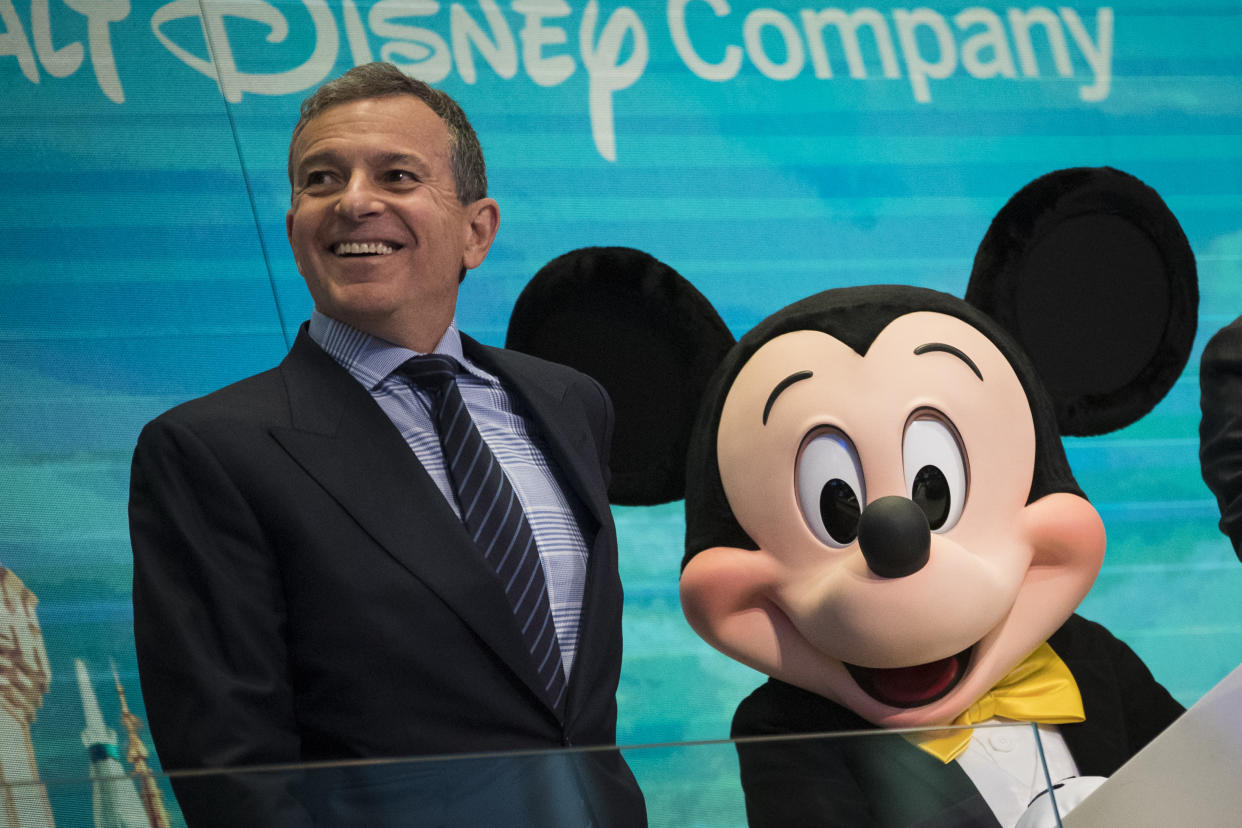 NEW YORK, NY - NOVEMBER 27: (L to R) Chief executive officer and chairman of The Walt Disney Company Bob Iger and Mickey Mouse look on before ringing the opening bell at the New York Stock Exchange (NYSE), November 27, 2017 in New York City. Disney is marking the company's 60th anniversary as a listed company on the NYSE. (Drew Angerer/Getty Images)